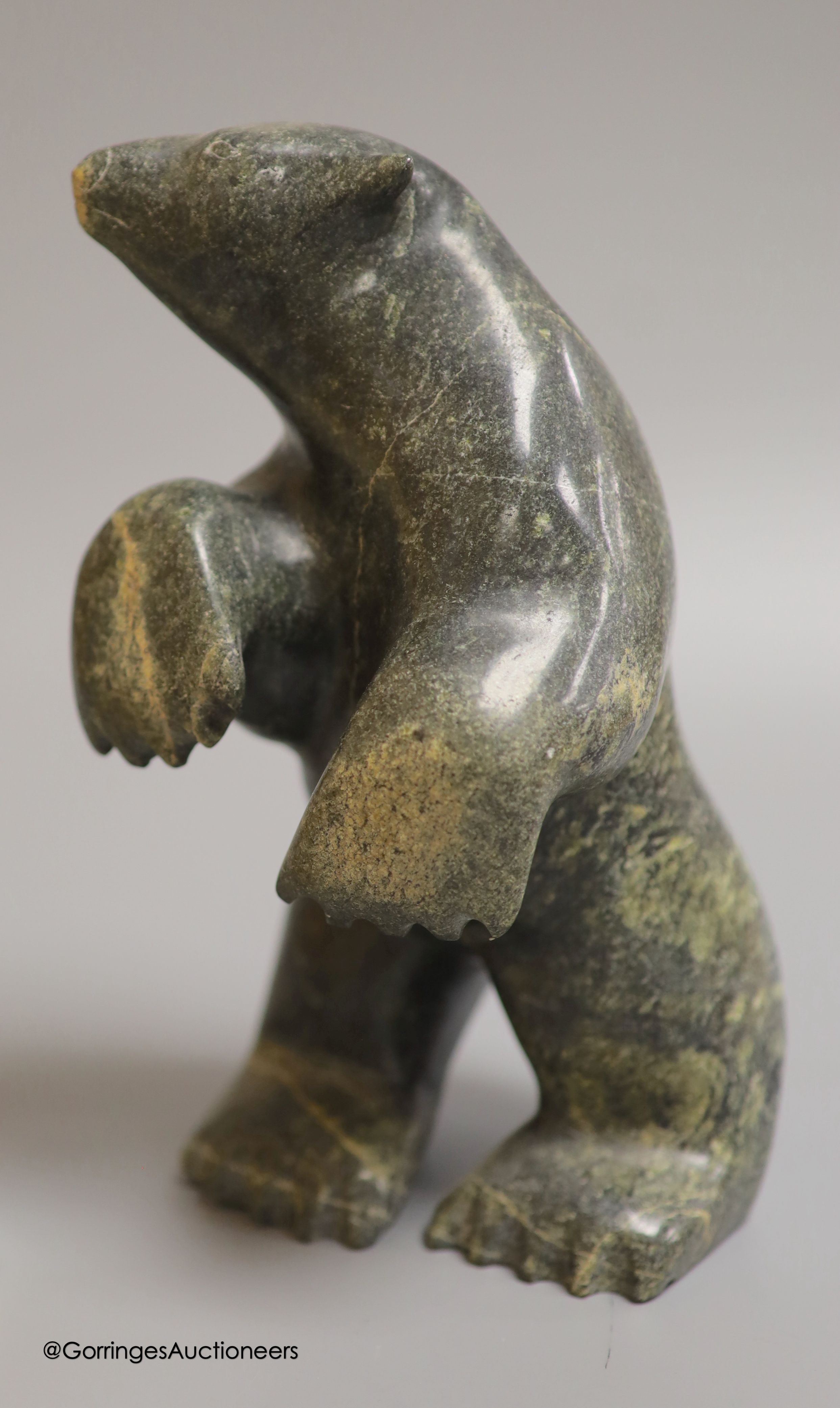 An Inuit stone bear and a collection of Meerschaum pipes